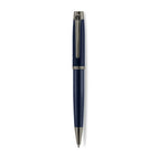 A high-resolution studio presentation of the Aigner Albano men's luxury ballpoint pen displayed horizontally against a white background, highlighting its metal barrel finished with a textured, spiral-grooved blue lower grip, a smooth blue upper body, a multi-ringed gunmetal center band, an IP gunmetal pocket clip featuring the horseshoe logo, and the matching gunmetal writing tip cone.