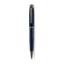 A high-resolution studio presentation of the Aigner Albano men's luxury ballpoint pen displayed horizontally against a white background, highlighting its metal barrel finished with a textured, spiral-grooved blue lower grip, a smooth blue upper body, a multi-ringed gunmetal center band, an IP gunmetal pocket clip featuring the horseshoe logo, and the matching gunmetal writing tip cone.