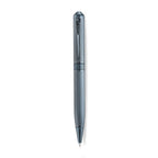 A high-resolution studio shot of the Aigner Ettoro men's luxury ballpoint pen displayed horizontally, highlighting its textured gunmetal-blue and chrome brass barrel, the central engraved Aigner brand band, the integrated pocket clip, and the exposed fine writing tip.