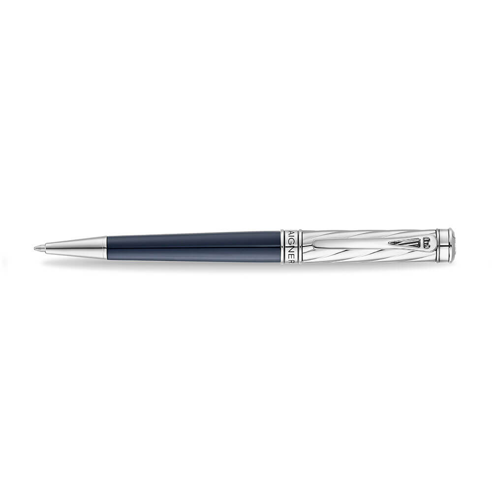 A high-resolution studio presentation of the Aigner Modeno Due men's luxury ballpoint pen displayed horizontally against a white background, highlighting its brass barrel finished with a smooth midnight-blue lower grip, a silver-tone cap engraved with diagonal spiraling grooves, a vertical Aigner logo on the central silver band, a sleek pocket clip, and the exposed fine writing tip.