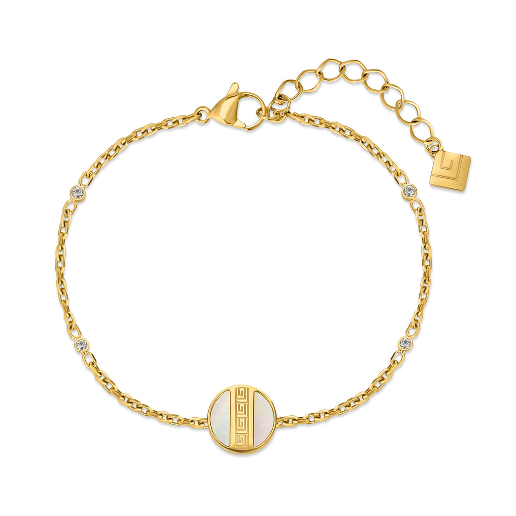 Gold-toned bracelet with a mother-of-pearl disc featuring a Greek key pattern, clear round stones, and a lobster clasp.