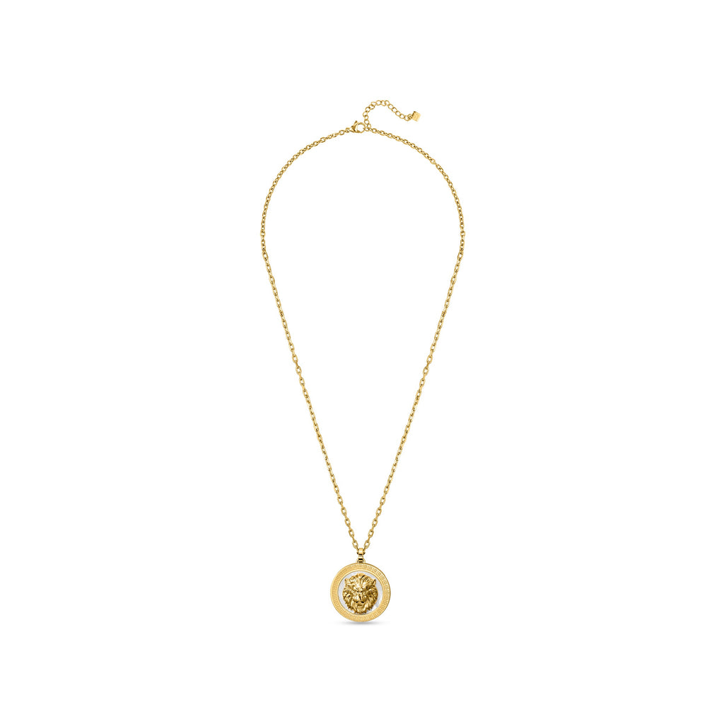 Gold-toned necklace with a round pendant featuring a raised lion's head and a white mother-of-pearl-like rim with Greek key p