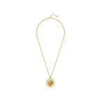 Gold-toned necklace with a round pendant featuring a raised lion's head and a white mother-of-pearl-like rim with Greek key p