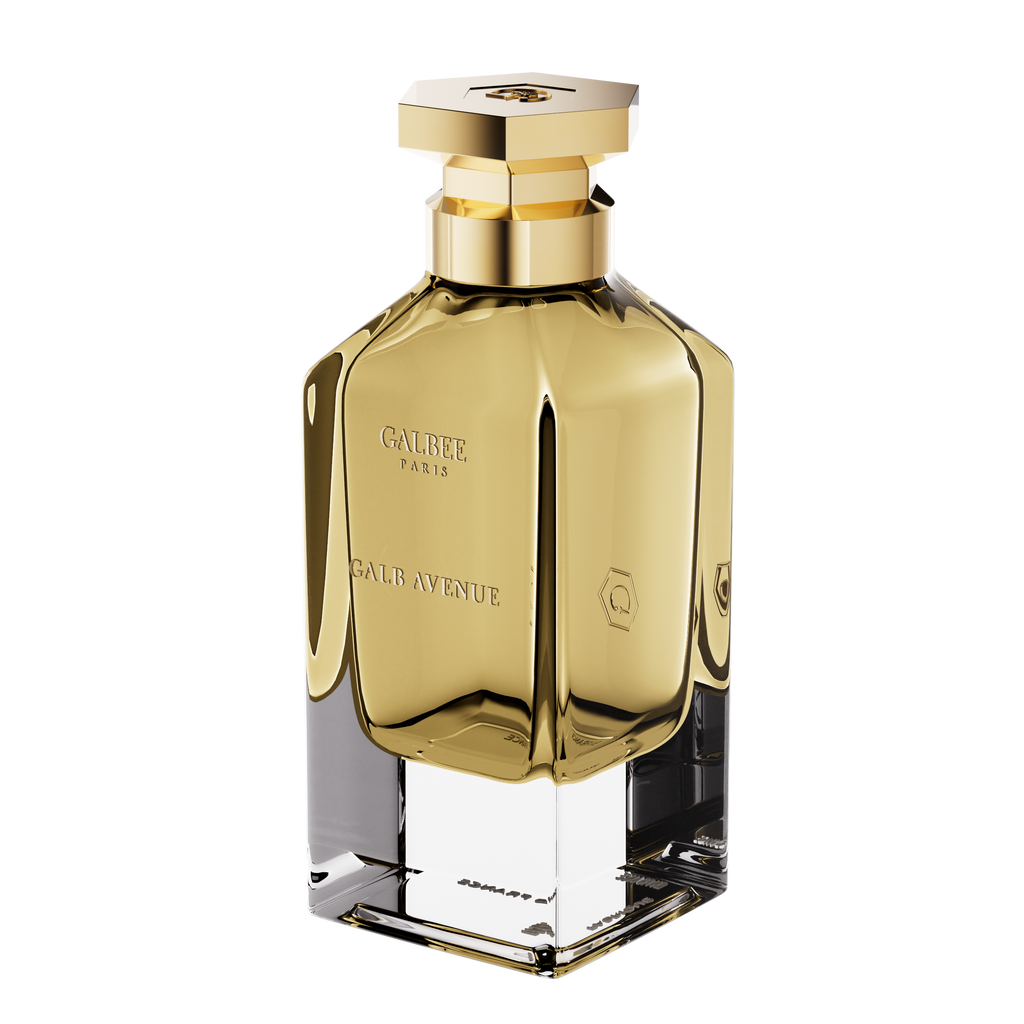 A three-quarter perspective view of the Galbee Paris Galbee Is Woody perfume bottle, showing its clear glass base, amber interior, and hexagonal gold cap.