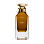 A front-facing view of the Galbee Is Woody perfume bottle, highlighting the gold-etched branding and the signature hexagonal emblem on the glass.