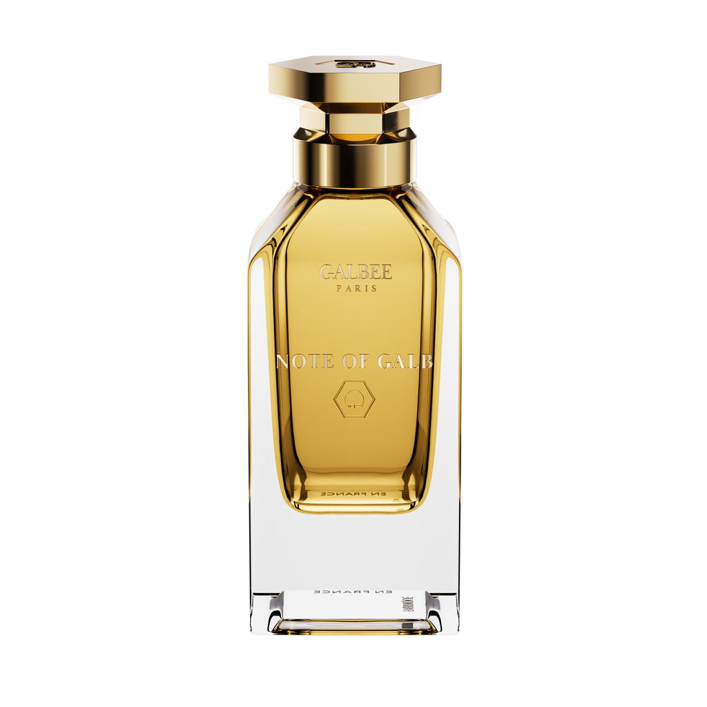 A front view of the Galbee Paris Note of Galb perfume bottle, featuring a clear glass exterior, a golden interior, and a gold hexagonal cap.