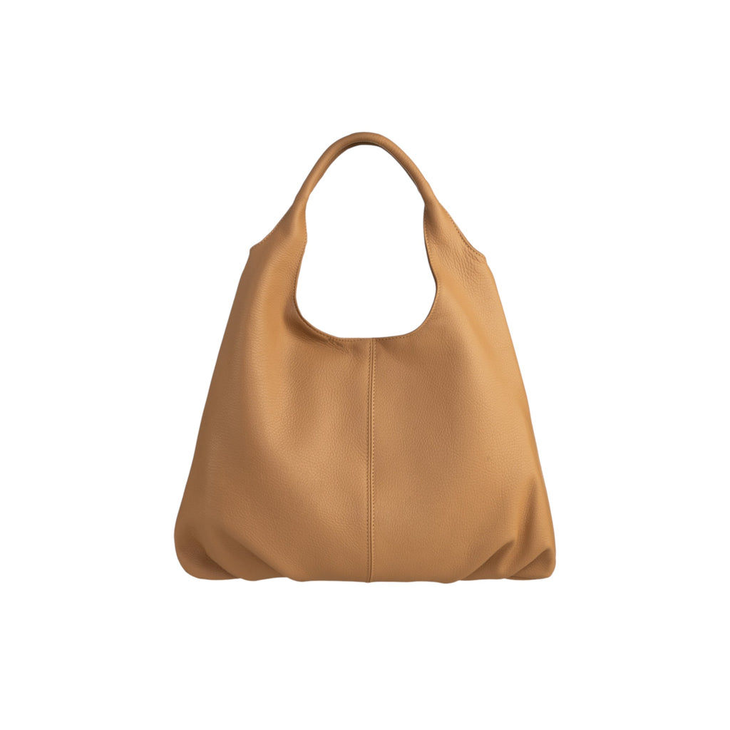 Warm beige pebbled leather hobo bag with a single curved shoulder strap and a vertical seam down the front.