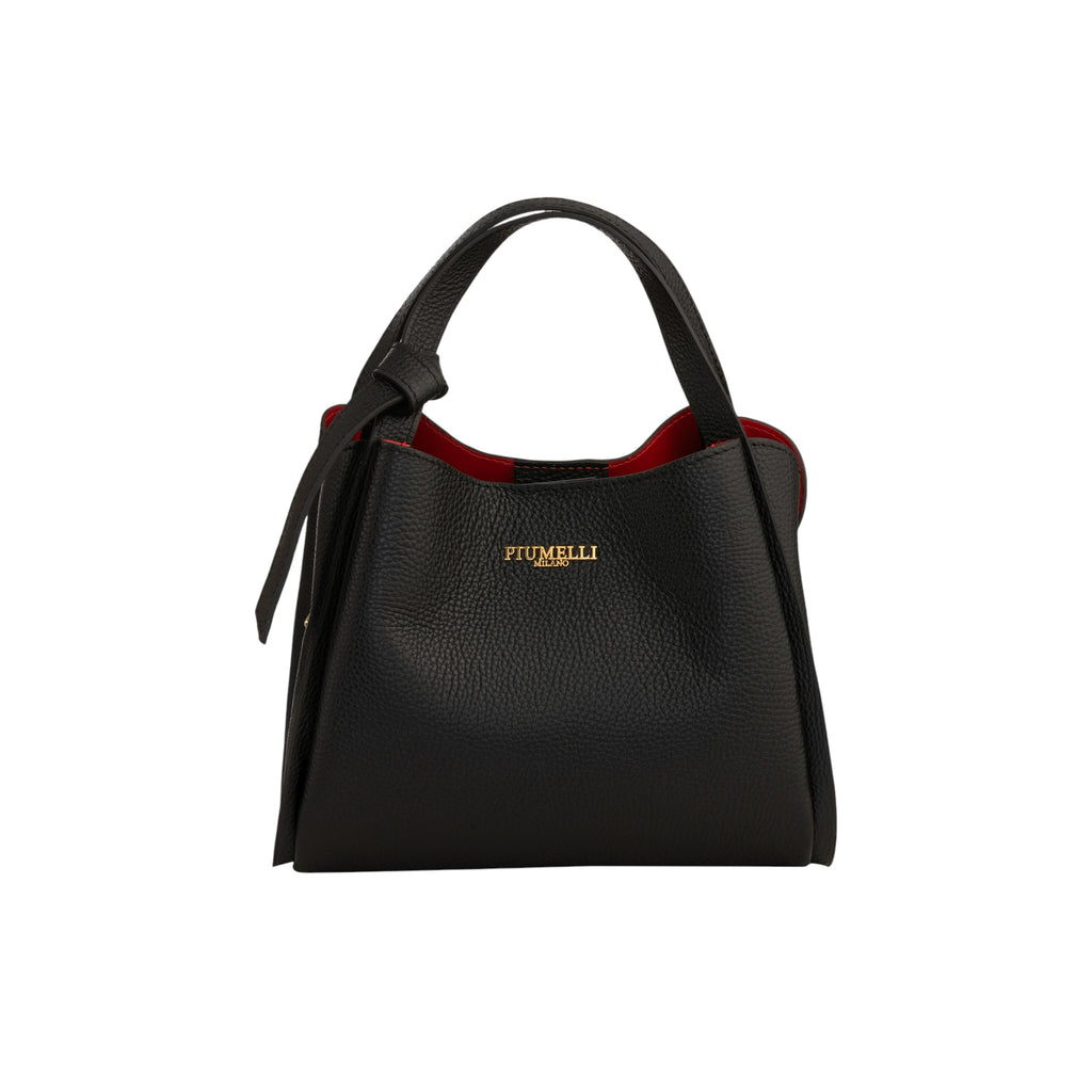 Black pebbled leather handbag with red lining, two top handles, one with a knot, and a gold-toned Piumelli Milano logo.