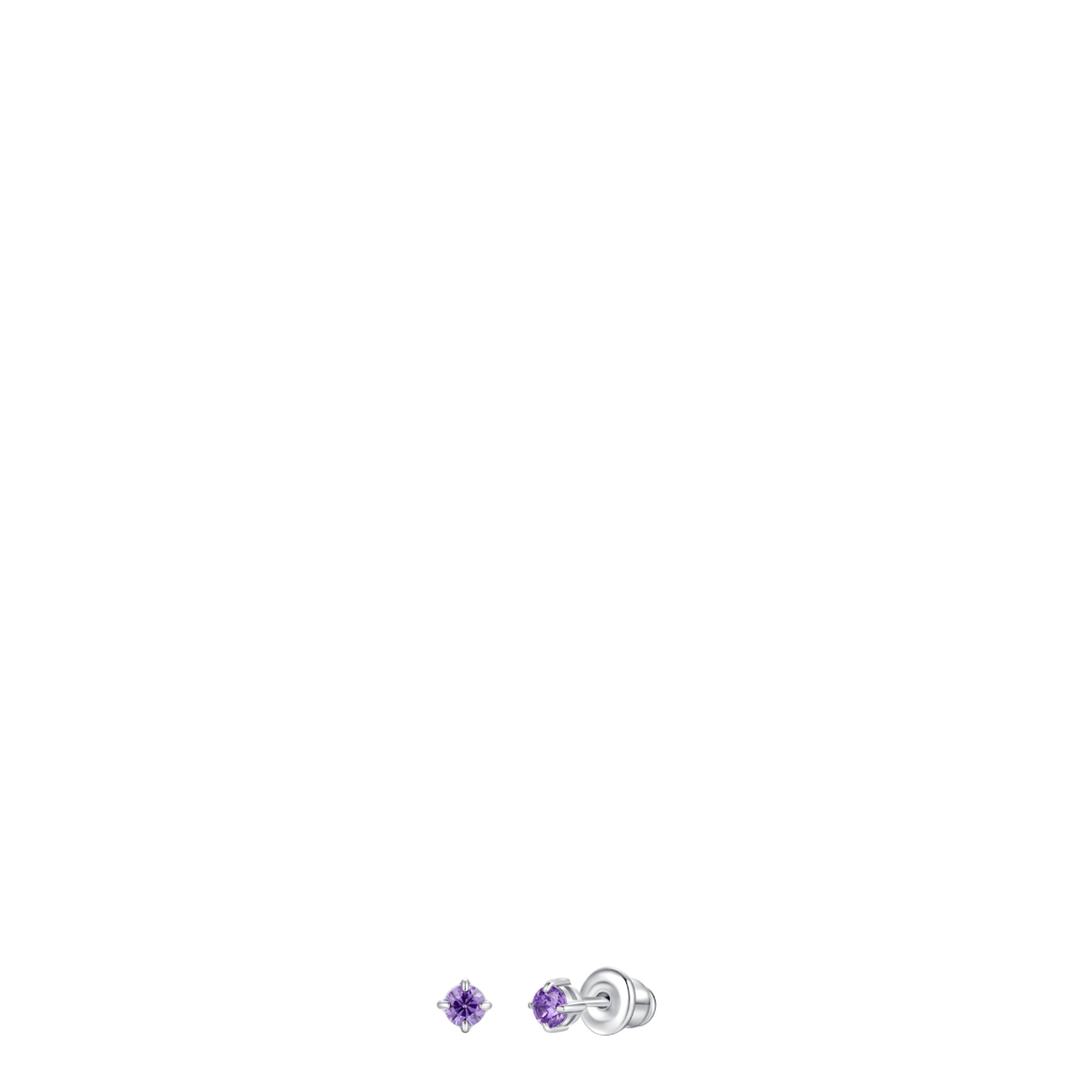 A pair of small silver-toned stud earrings, each with a round, faceted purple zircon stone in a four-prong setting. One earri