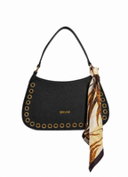 Front view of Just Cavalli women's black pebbled leather shoulder bag featuring antique gold eyelets and a printed scarf tied to the handle