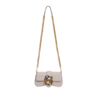Front view of Just Cavalli women's black leather mini chain shoulder bag with signature gold-tone snake buckle and long chain strap
