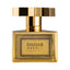 Gold-toned rectangular perfume bottle with a central label, concentric circle pattern, and a geometric faceted cap.