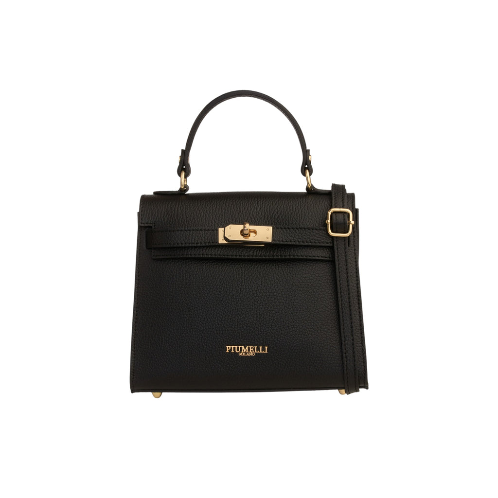 Warm beige grained leather top-handle handbag with a front flap, gold-toned turn-lock closure, and adjustable shoulder strap.