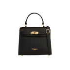 Warm beige grained leather top-handle handbag with a front flap, gold-toned turn-lock closure, and adjustable shoulder strap.