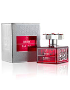The Kajal Ruby Eau De Parfum bottle presented alongside its textured silver and red metallic packaging.