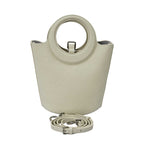 Karisma women’s leather bucket bag with circular handle and front strap closure
