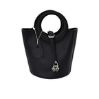 Karisma women’s leather bucket bag with circular handle and front strap closure