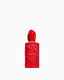 Red rectangular perfume bottle with a matte finish, embossed 'SI' lettering, a glossy red rounded cap, and a gold-toned neck