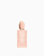 Light pink Giorgio Armani Si Nude Bloom Eau de Parfum bottle with an embossed 'SI' logo and a gold-toned neck.