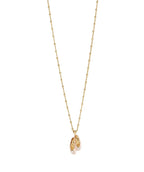 Les Nereides Women's Pink Pallet Slipper Pendant Necklace Gold necklace with a pendant on a white background