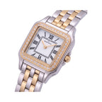 Two-tone metal rectangular watch, white dial, black Roman numerals, gold-toned bezel with clear stones, link bracelet.