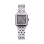 Silver-toned Monteva ladies watch with a cushion-shaped case, grey dial, and a bezel set with small clear stones.