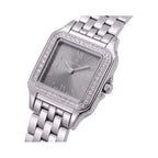 Silver-toned rectangular watch with a grey dial, Roman numerals, and a bezel encrusted with clear stones on a link bracelet.