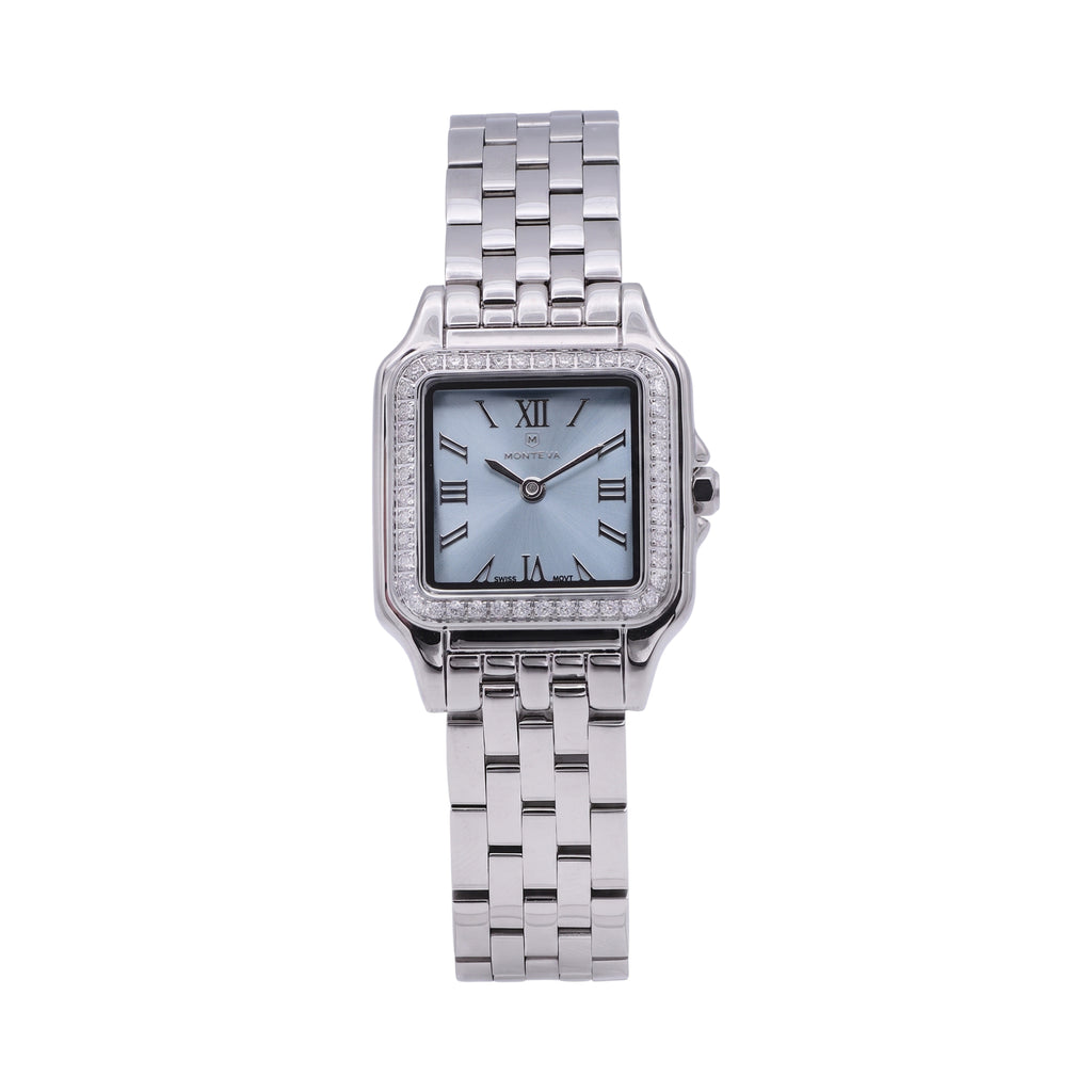 Monteva ladies' watch with a silver-toned multi-link bracelet, square case, light blue dial, and crystal-embellished bezel.