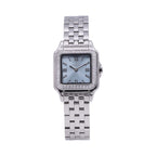 Monteva ladies' watch with a silver-toned multi-link bracelet, square case, light blue dial, and crystal-embellished bezel.