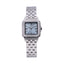 Monteva ladies' watch with a silver-toned multi-link bracelet, square case, light blue dial, and crystal-embellished bezel.