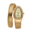 Gold-toned Monteva women's watch with a coiled snake-style bracelet and an oval case with a crystal-embellished bezel.