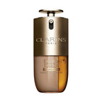 Clarins Double Serum Foundation in a gold-toned and transparent bottle, showing a beige foundation and an amber serum.