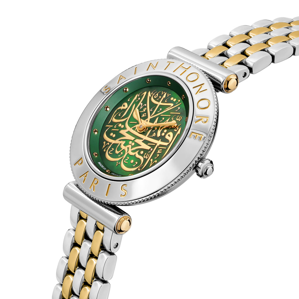 Close-up view focusing on the polished gold leaf hands, the intricate fine details of the golden Arabic calligraphy artwork, and the gold-accented T-bar lugs.
