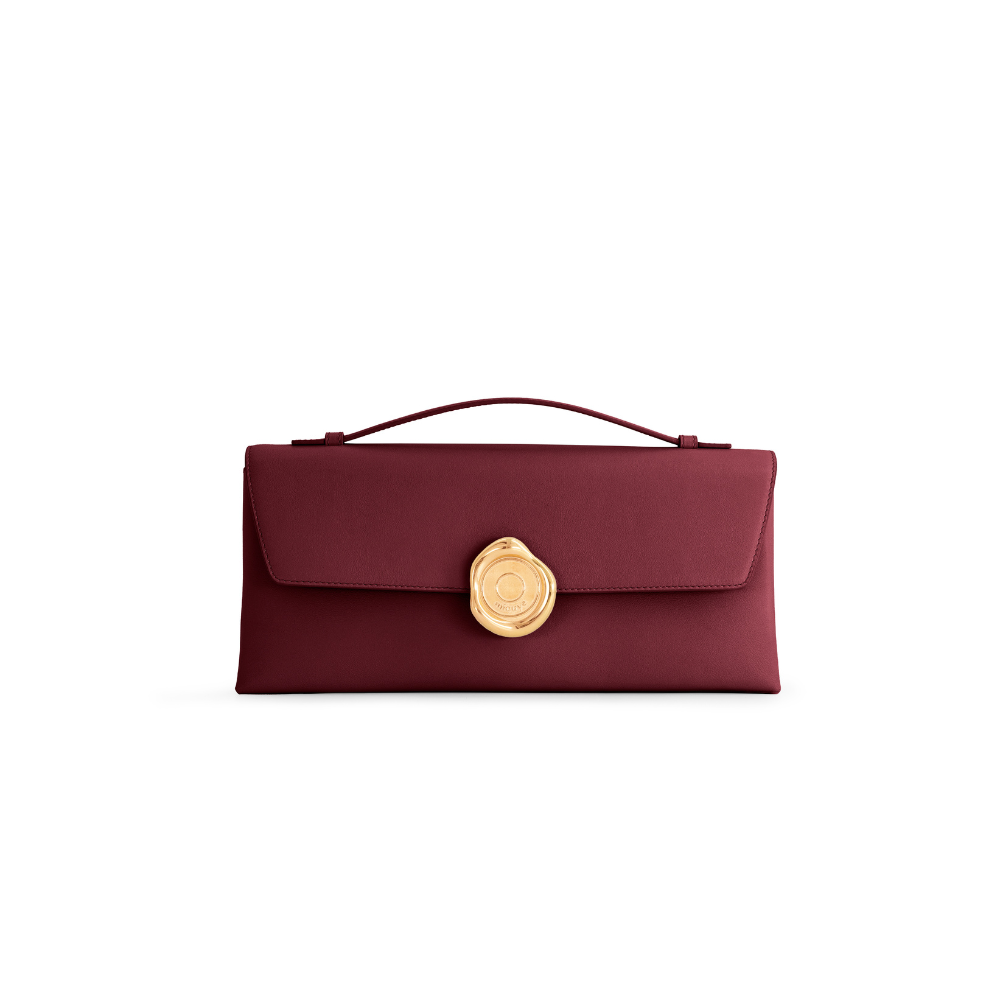 Image Alt Text

Mlouye Seal Clutch leather handbag in Bordeaux with signature gold-tone Seal clasp