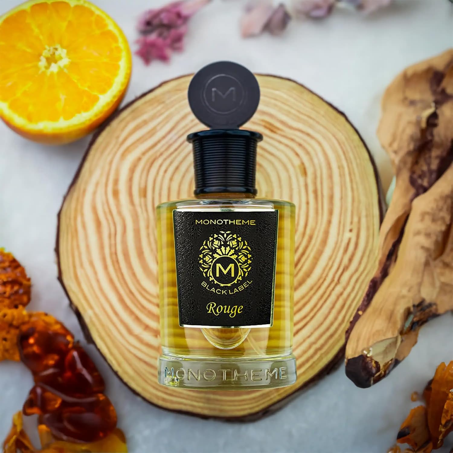 Monotheme Black Label Rouge Eau de Parfum 100ml in a black and gold bottle, available for online purchase at Paris Gallery Qatar