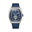 Monteva gents limited edition tonneau watch front view featuring textured blue dial, silver-tone barrel-shaped case, small seconds subdial, date window and navy-blue stitched strap