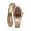 Monteva ladies' watch with a brown teardrop dial, gold-toned bezel with clear stones, and a coiled silver-toned and gold-tone