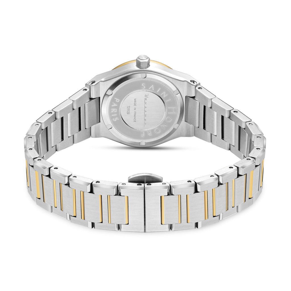 Back of a silver-toned watch with a gold-toned crown and a two-toned metal bracelet featuring silver-toned outer links and go