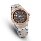 Silver-toned watch with an octagonal case, rose gold-toned bezel, dark gray patterned dial with three subdials, and a silver-