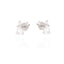 Pair of silver-toned stud earrings, each with a small clear round stone and a larger clear pear-shaped drop stone.