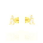Pair of gold-toned stud earrings, each featuring a small round clear stone above a larger pear-shaped clear stone.