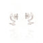 Pair of silver-toned spiral stud earrings, each adorned with pave-set clear stones and a marquise-cut clear stone.