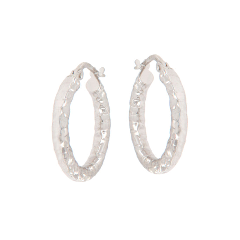 Pair of silver-toned hoop earrings with a hammered, textured surface.