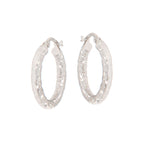 Pair of silver-toned hoop earrings with a hammered, textured surface.