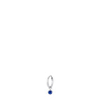 Silver-toned steel hoop earring with a dangling round blue zircon in a silver-toned setting.