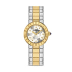 Saint Honore women's watch with a round gold-toned case, white floral patterned dial, and two-tone gold and silver link brace