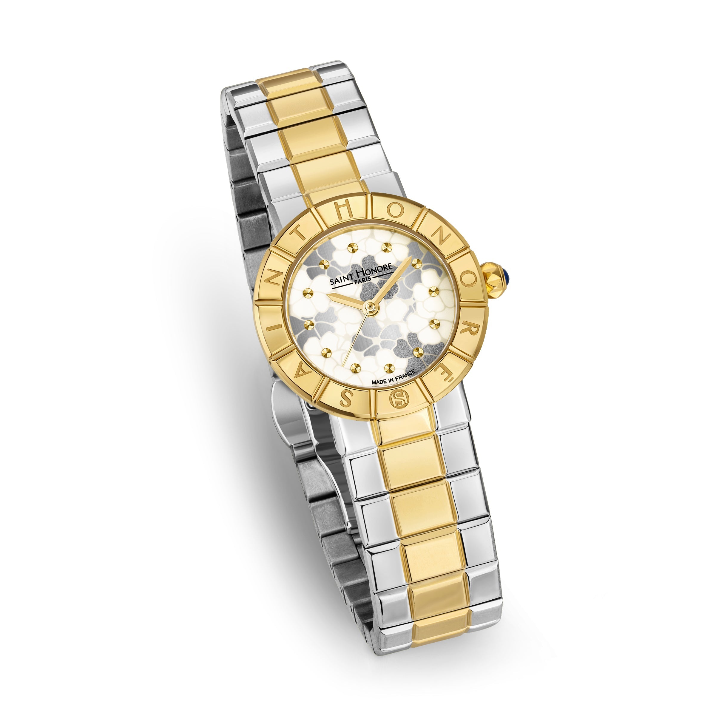 Bicolor watch with a gold-toned bezel engraved with 'SAINT HONORE', a white floral pattern dial, and a gold-toned and silver-