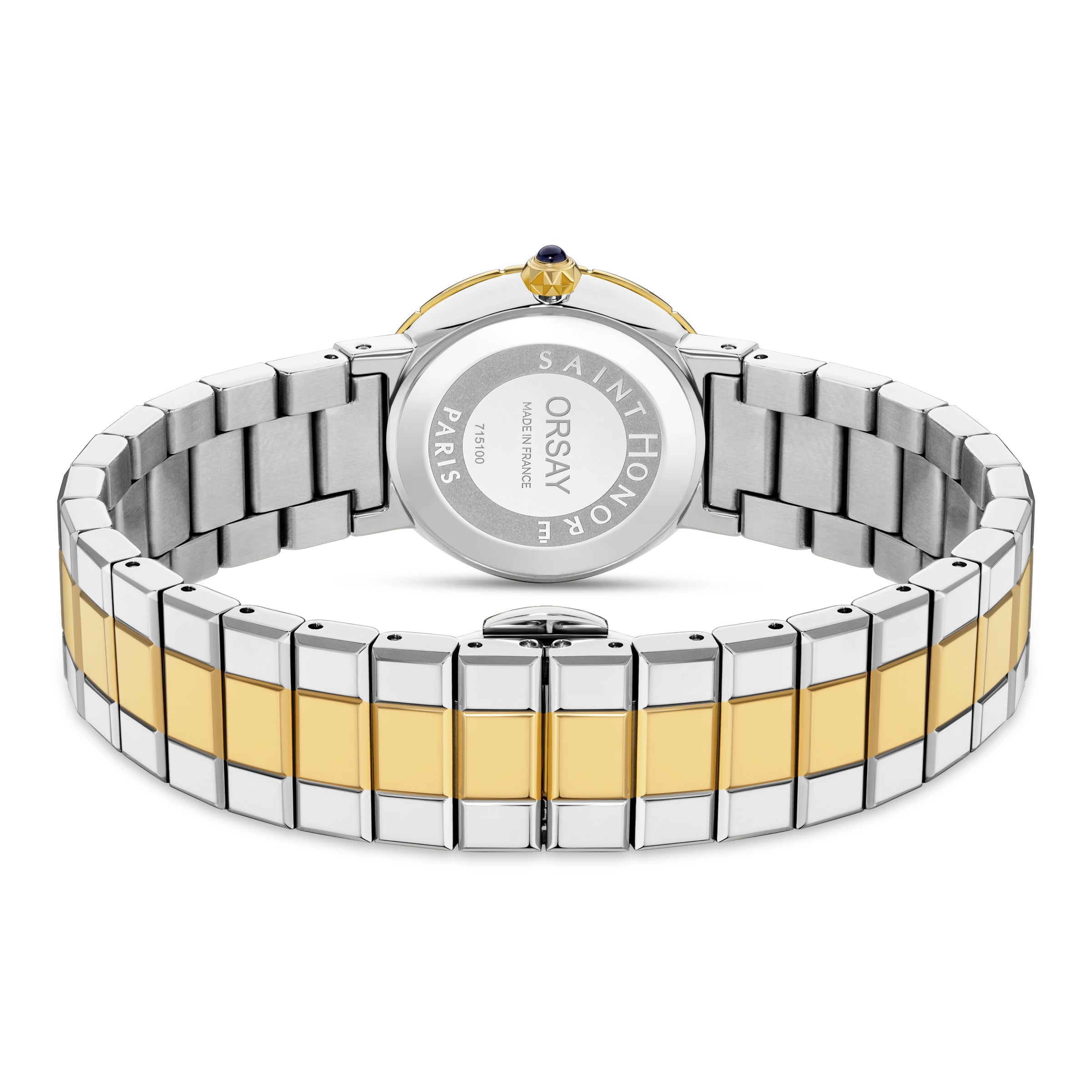 Back of a watch with a silver-toned case, gold-toned bezel, and crown with a dark blue stone. Two-toned silver and gold-toned