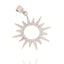 Silver-toned sunburst charm with a central circular cutout and pointed rays, pavé-set with clear cubic zirconia stones.
