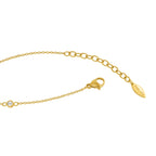 Gold-toned chain bracelet with a clear crystal, lobster clasp, and an extension chain ending in a "POLICE" tag.
